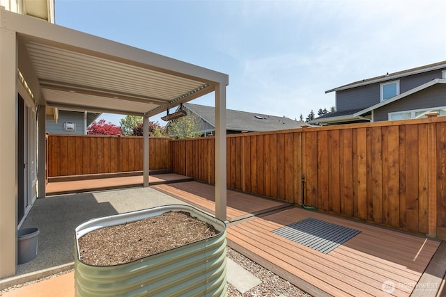 view of patio / terrace with a fenced backyard and a deck