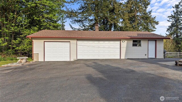 detached garage with fence