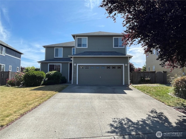 9206 Carys St SE, Yelm, WA 98597 - traditional-style home with a garage and driveway
