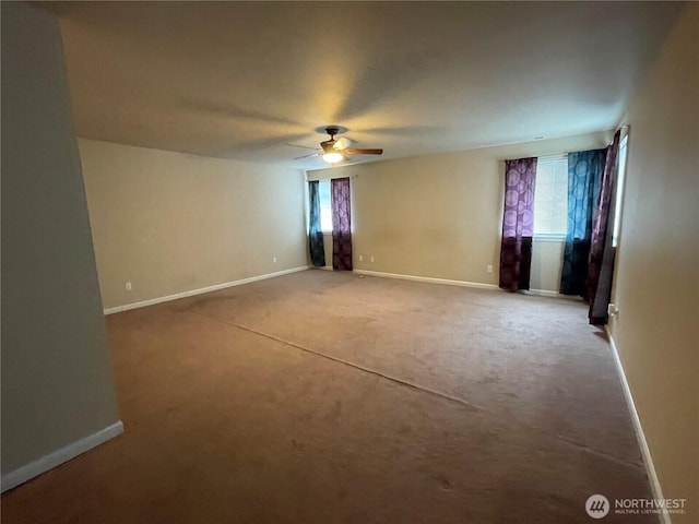 9206 Carys St SE, Yelm, WA 98597 - unfurnished room with a ceiling fan and light colored carpet