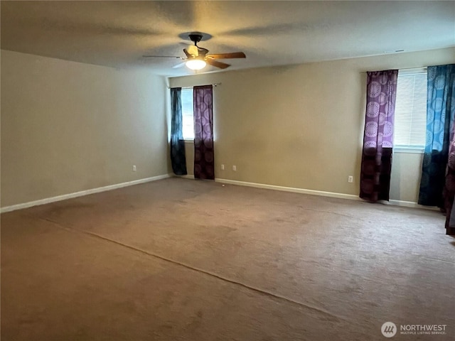 9206 Carys St SE, Yelm, WA 98597 - spare room featuring carpet flooring and ceiling fan