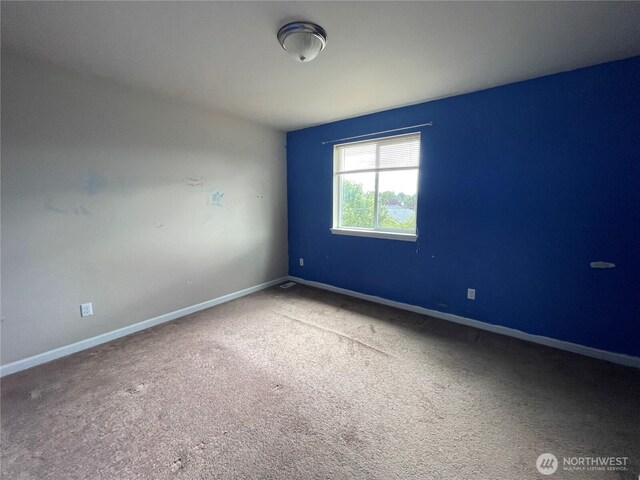 9206 Carys St SE, Yelm, WA 98597 - unfurnished room with carpet and baseboards