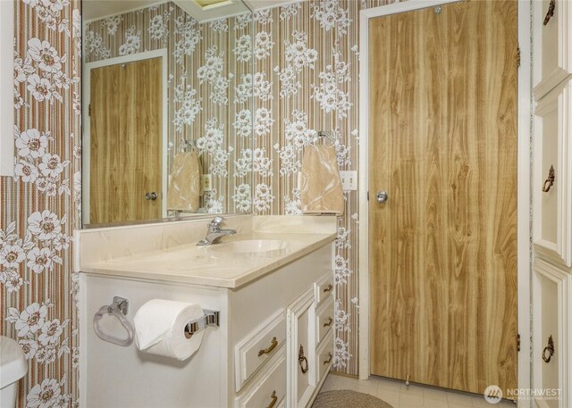 111 Dryke Rd Unit 66, Sequim, WA 98362 - bathroom with tile patterned floors, vanity, and wallpapered walls