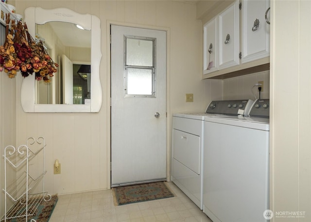 111 Dryke Rd Unit 66, Sequim, WA 98362 - laundry room featuring washer and dryer, cabinet space, and light floors