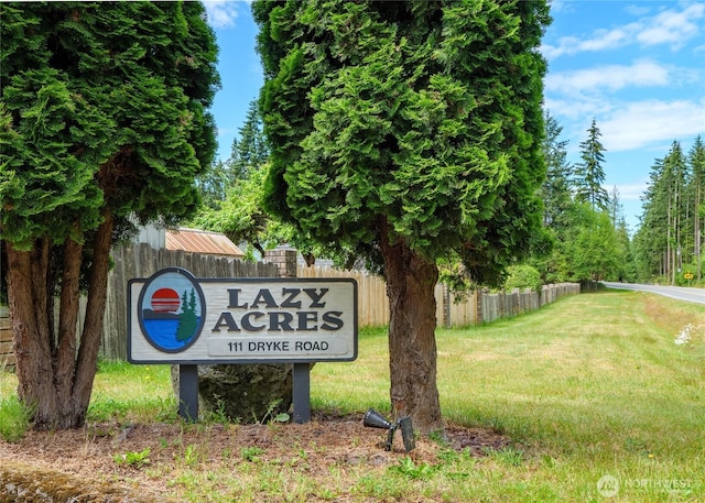111 Dryke Rd Unit 66, Sequim, WA 98362 - community sign with a yard and fence
