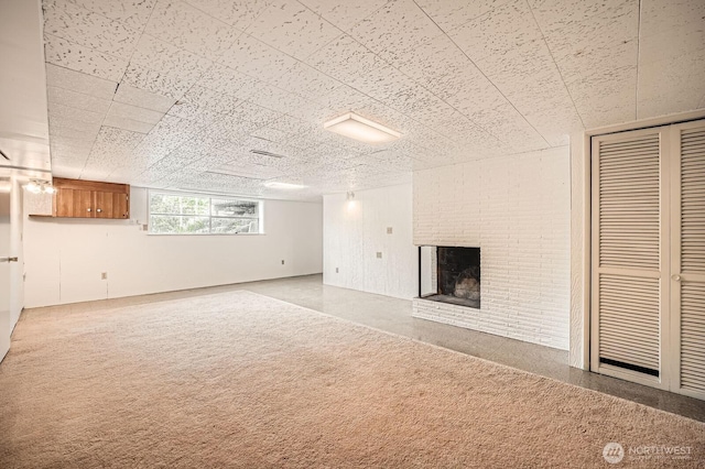 interior space featuring a brick fireplace