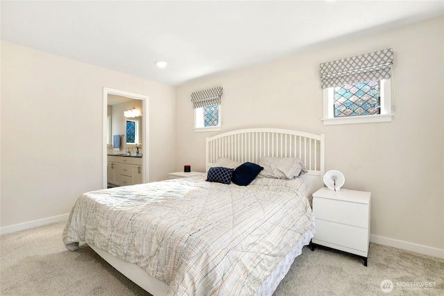22125 Jameson Ave NW, Poulsbo, WA 98370 - carpeted bedroom with baseboards and ensuite bathroom