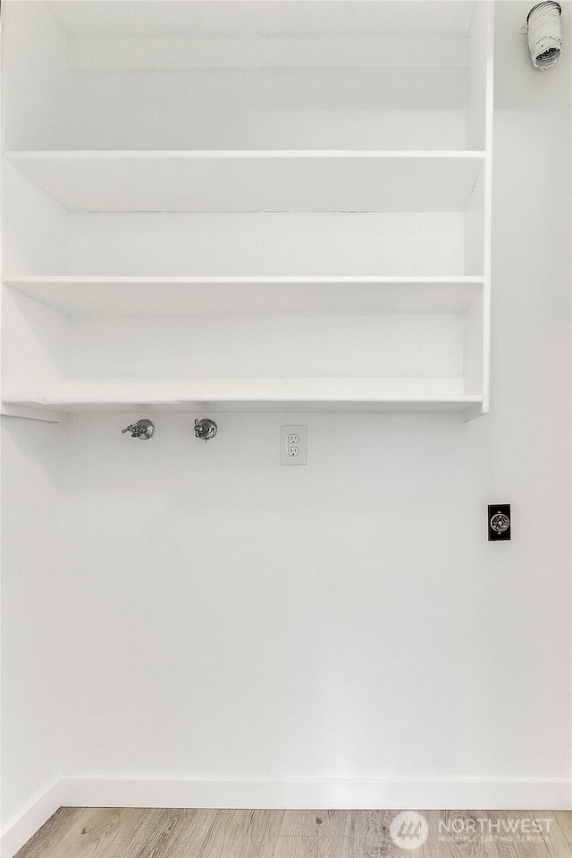21615 80th Ave W Unit 101, Edmonds, WA 98026 - mudroom featuring baseboards and light wood finished floors