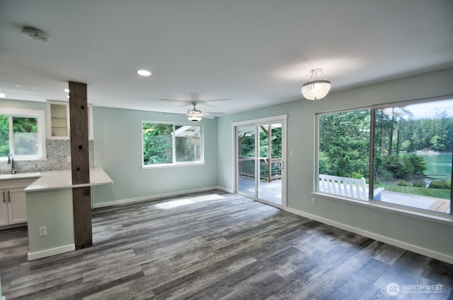 41 SE Wildcat Cove Rd, Shelton, WA 98584 - unfurnished living room with dark wood-style flooring, baseboards, recessed lighting, and ceiling fan