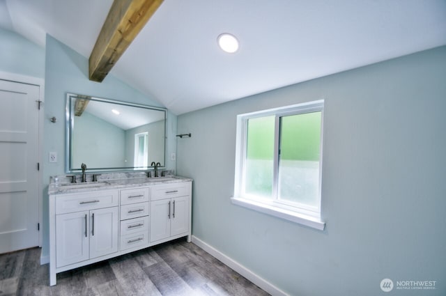 41 SE Wildcat Cove Rd, Shelton, WA 98584 - bathroom featuring wood finished floors, double vanity, and baseboards
