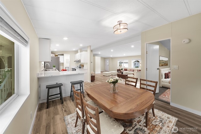 602 165th Street Ct E Unit 37, Spanaway, WA 98387 - dining space with wood finished floors and baseboards