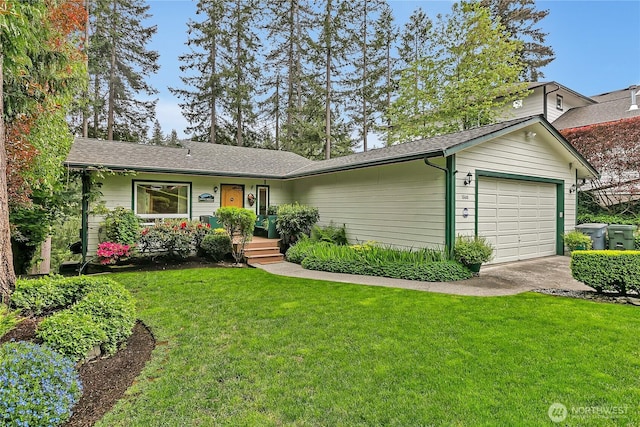 ranch-style home with a front lawn, a garage, and a shingled roof