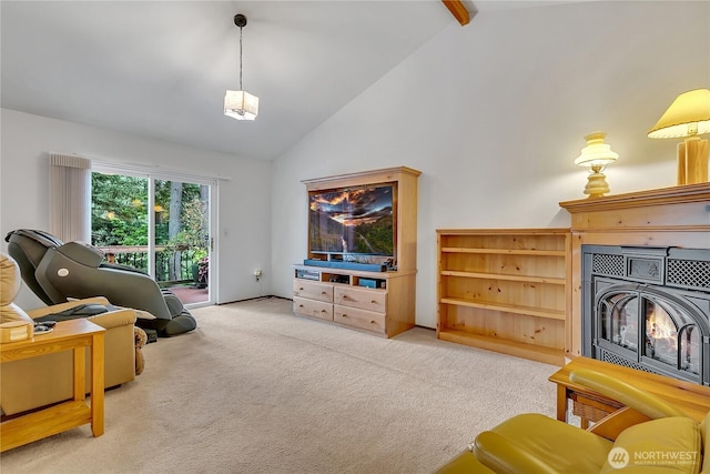 living area with carpet flooring, high vaulted ceiling, and beamed ceiling