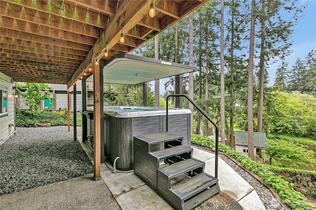 view of patio featuring a hot tub