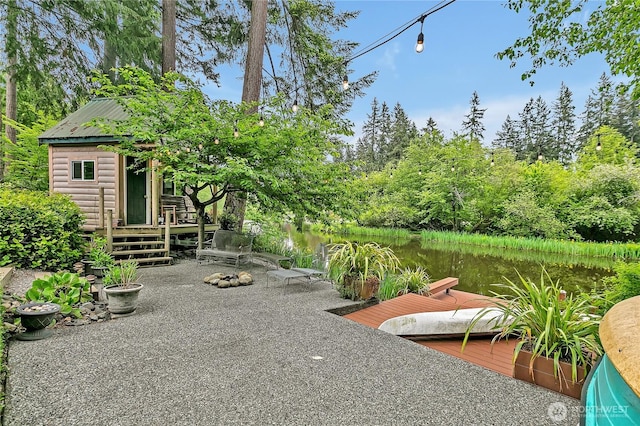 view of patio / terrace with a water view
