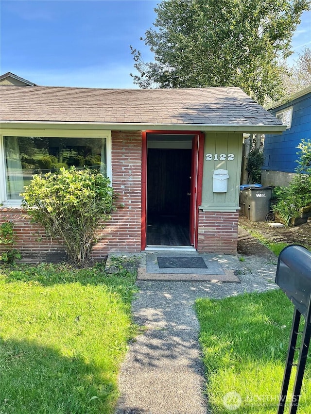 2122 15th St, Bremerton, WA 98312 - property entrance featuring brick siding and roof with shingles