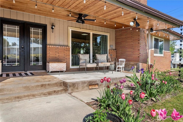 780 10th St NE, East Wenatchee, WA 98802 - entrance to property with brick siding, french doors, covered porch, and ceiling fan