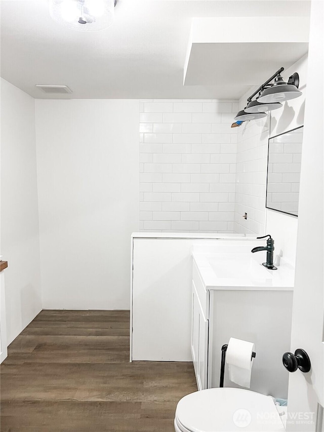780 10th St NE, East Wenatchee, WA 98802 - bathroom with vanity and wood finished floors