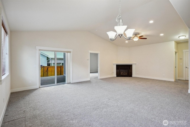 14431 22nd Avenue Ct E, Tacoma, WA 98445 - unfurnished living room featuring carpet flooring, a fireplace, recessed lighting, baseboards, and vaulted ceiling