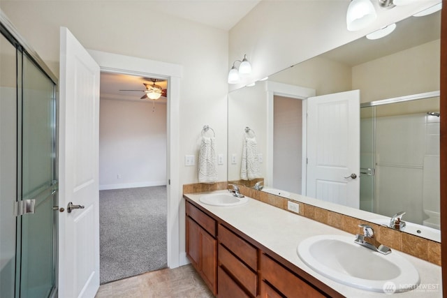 14431 22nd Avenue Ct E, Tacoma, WA 98445 - full bathroom with a ceiling fan, a sink, a shower with shower door, and double vanity