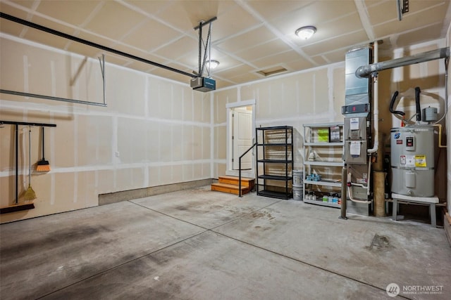 14431 22nd Avenue Ct E, Tacoma, WA 98445 - garage with strapped water heater and a garage door opener