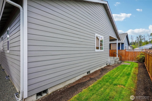 14431 22nd Avenue Ct E, Tacoma, WA 98445 - view of side of home featuring fence and a yard