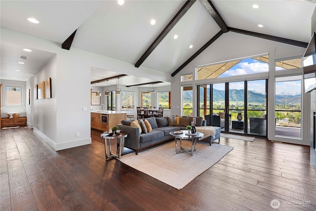 living room featuring recessed lighting, beamed ceiling, dark wood-style floors, and baseboards