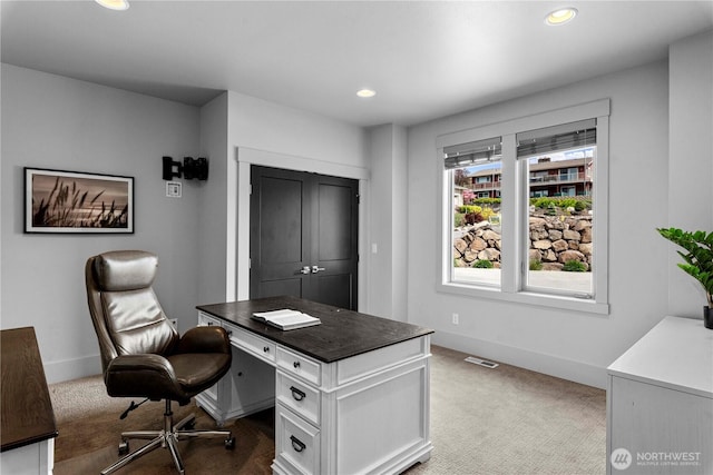 carpeted office space with visible vents, recessed lighting, and baseboards