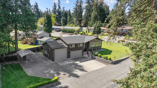 birds eye view of property with a residential view