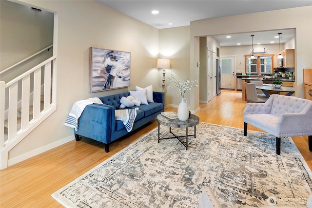 1740 NE Nutkana Way, Poulsbo, WA 98370 - living area with light wood finished floors, baseboards, and recessed lighting