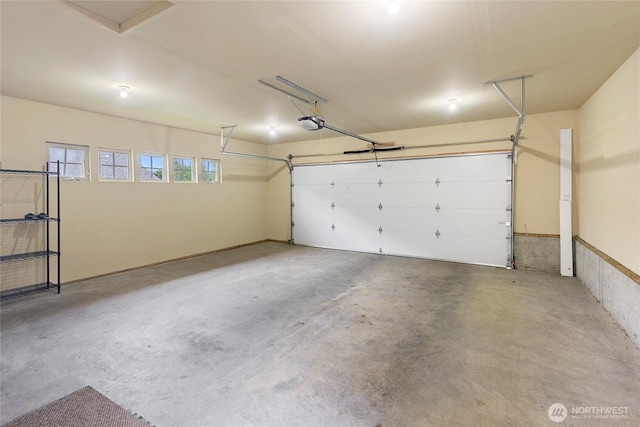 1740 NE Nutkana Way, Poulsbo, WA 98370 - garage featuring a garage door opener