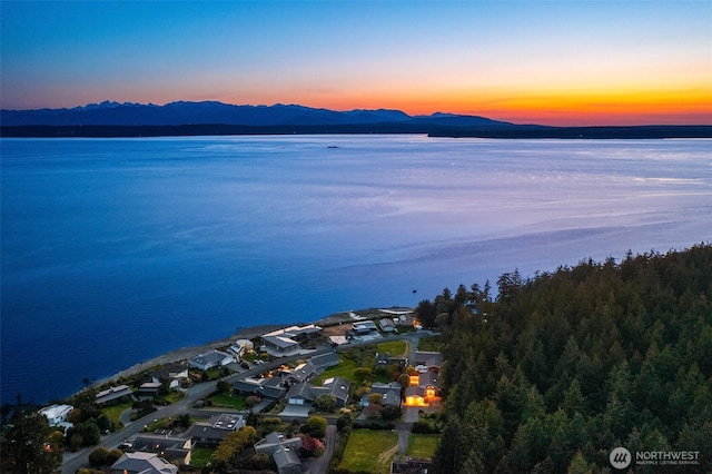aerial view with a residential view and a water and mountain view