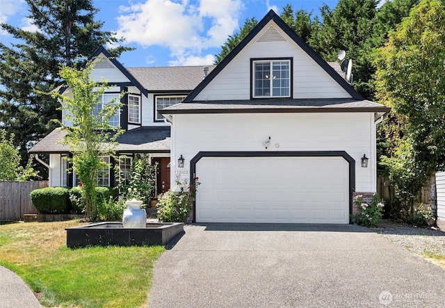13103 SE 261st Pl, Kent, WA 98030 - view of front of home featuring fence, a shingled roof, and driveway