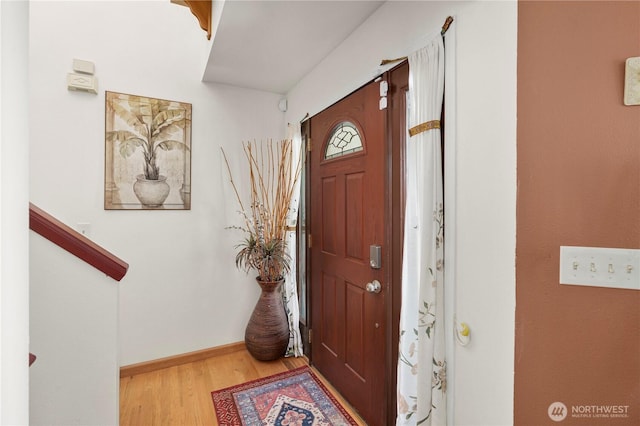 13103 SE 261st Pl, Kent, WA 98030 - entryway featuring light wood-type flooring and baseboards