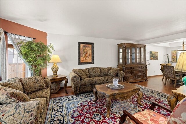 13103 SE 261st Pl, Kent, WA 98030 - living room featuring baseboards and wood finished floors