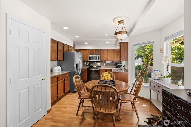 13103 SE 261st Pl, Kent, WA 98030 - dining room with light wood-style floors and recessed lighting