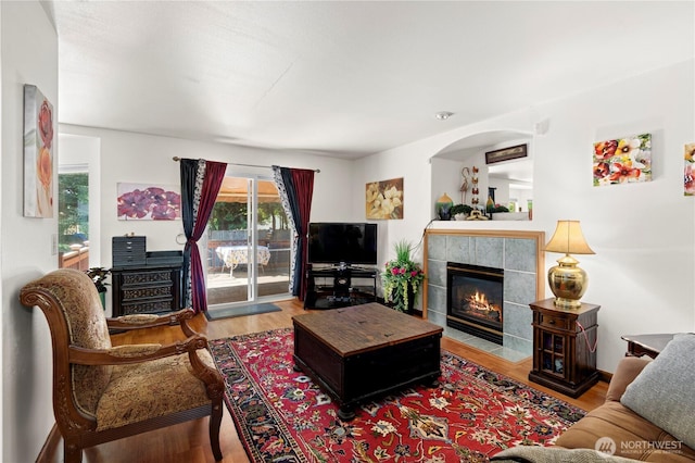 13103 SE 261st Pl, Kent, WA 98030 - living area with a tile fireplace and wood finished floors