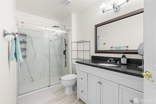 13103 SE 261st Pl, Kent, WA 98030 - full bath featuring toilet, visible vents, a marble finish shower, and vanity