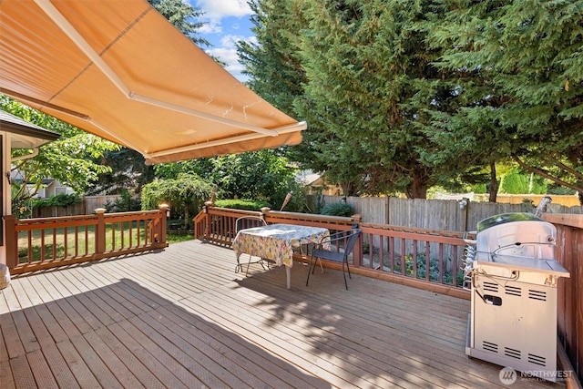 13103 SE 261st Pl, Kent, WA 98030 - wooden deck featuring a fenced backyard and outdoor dining space