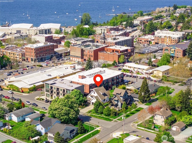 birds eye view of property featuring a water view