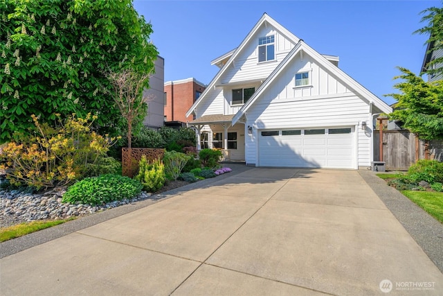 view of front of home with a garage, fence, a chimney, board and batten siding, and driveway
