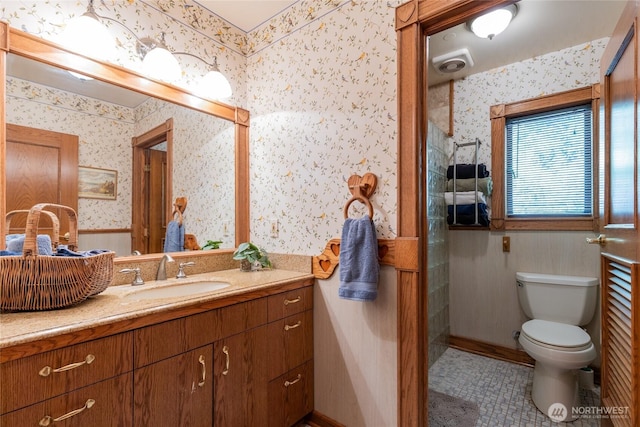 4385 Wildwood Ln, Anacortes, WA 98221 - full bath featuring wallpapered walls, vanity, toilet, and tile patterned flooring