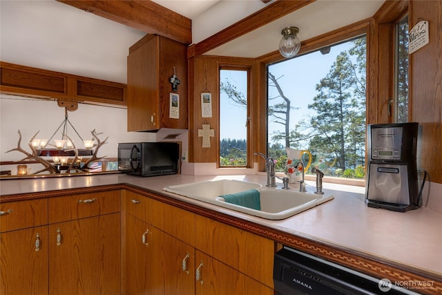 4385 Wildwood Ln, Anacortes, WA 98221 - kitchen with black microwave, a sink, dishwashing machine, healthy amount of natural light, and beam ceiling