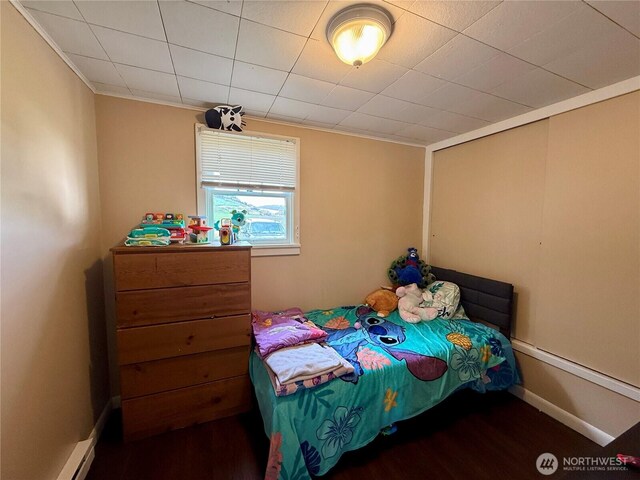 711 E Dayton Ave, Dayton, WA 99328 - bedroom featuring wood finished floors and ornamental molding