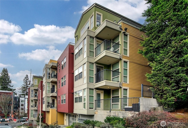 view of building exterior with central AC unit
