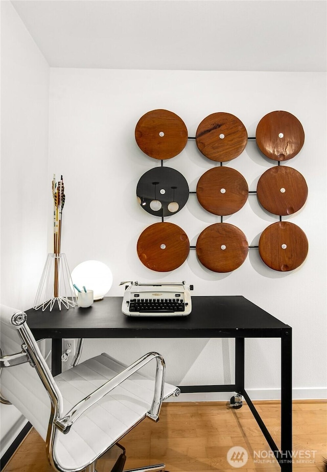 interior details with wood finished floors and baseboards