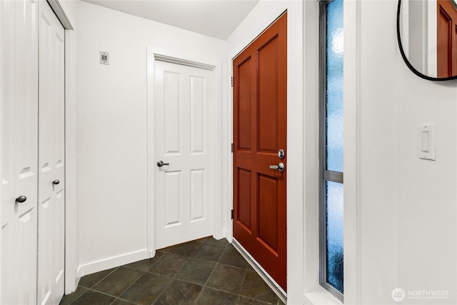 foyer with baseboards