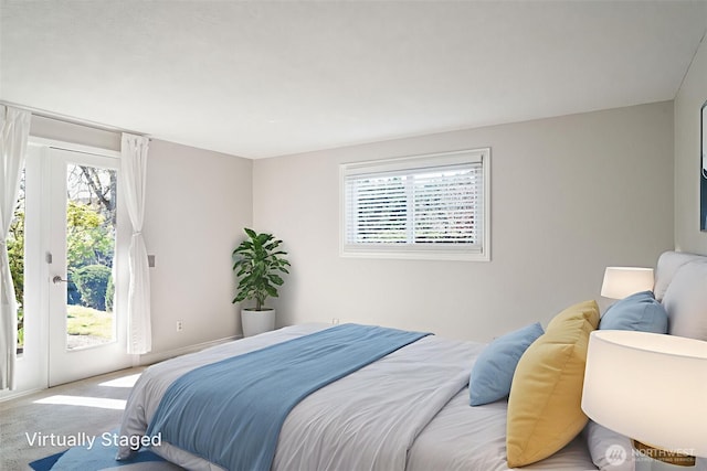 8305 NW Fruit Valley Rd, Vancouver, WA 98665 - carpeted bedroom with access to outside
