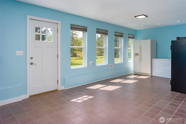 486 Wren Rd, Lopez Island, WA 98261 - foyer with baseboards, recessed lighting, a healthy amount of sunlight, and tile patterned flooring