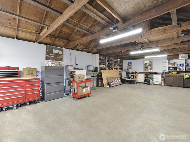 garage featuring a workshop area